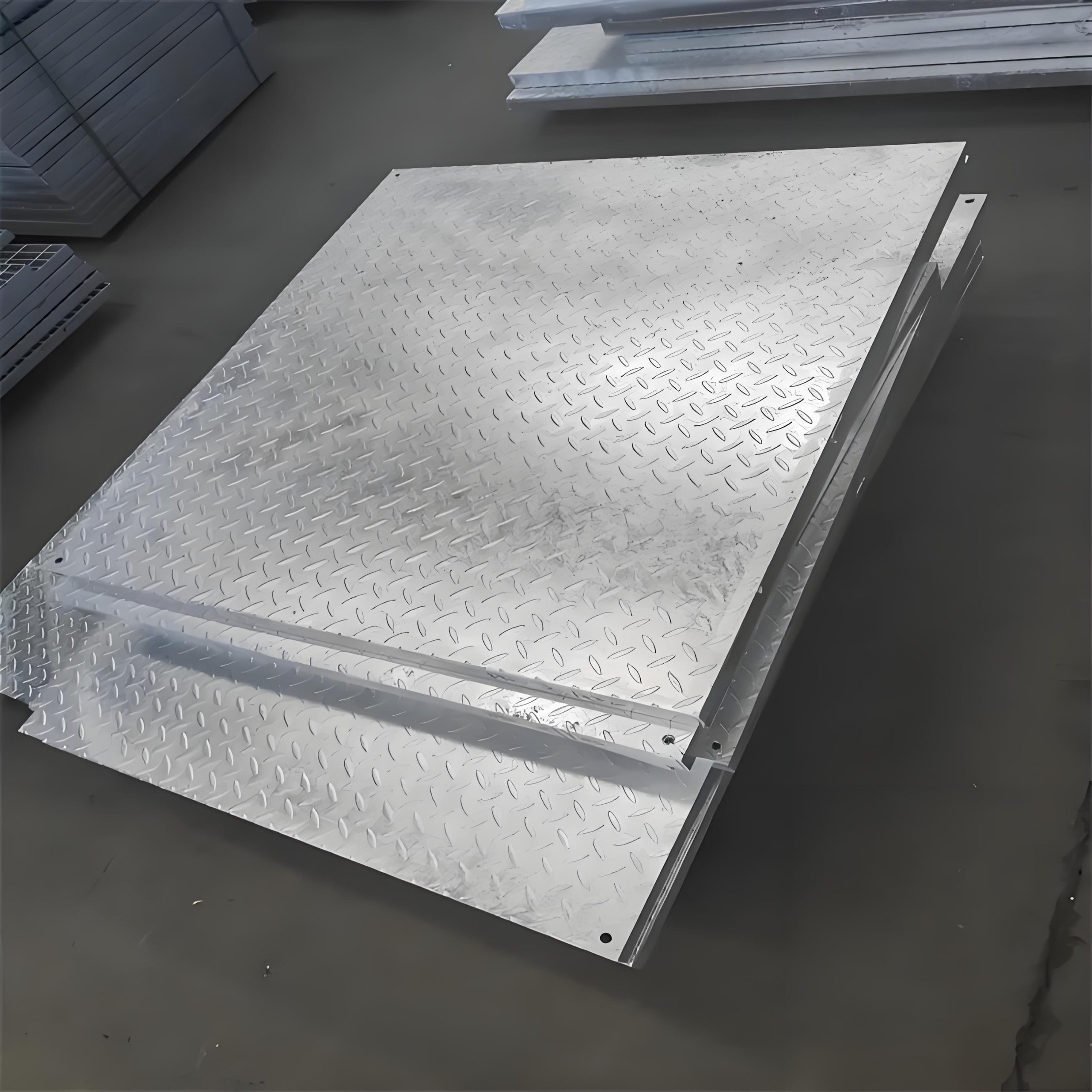 Catch basin steel cover plate